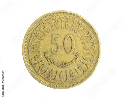 Tunisia fifty milliemes coin on white isolated background photo