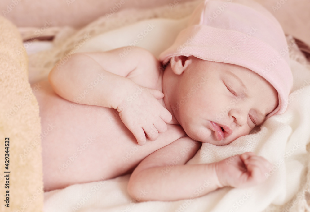 sleeping baby in pink hat close up sleeping baby in pink hat close up