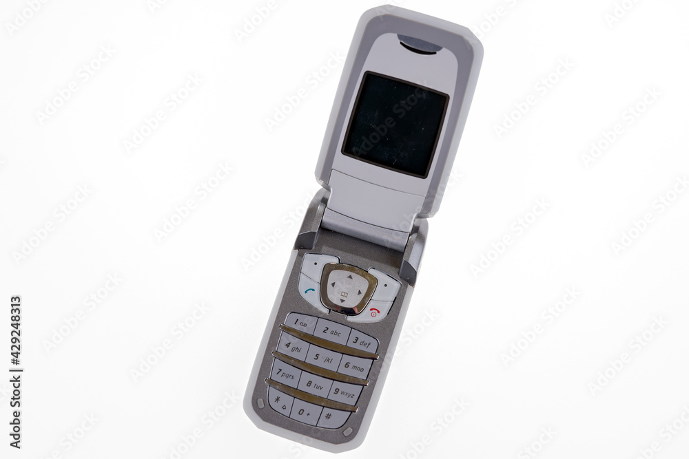 Old cell phone isolated on white background Old cell phone isolated on white background