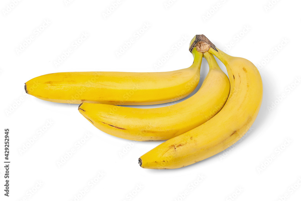 Yellow bananas isolated on white background. Three ripe bananas. Bunch of yellow bananas on a white surface. Exotic, tropical fruits.