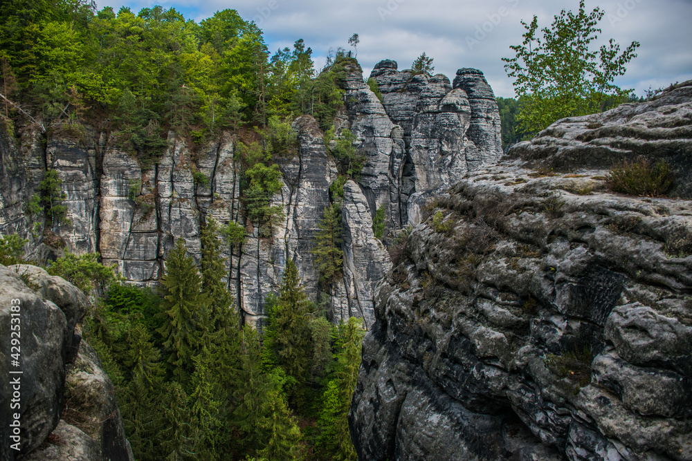 Saxon Switzerland is a unique natural wonder in Saxony, Germany. Sandstone cliffs in green valleys. Saxon Switzerland is a unique natural wonder in Saxony, Germany. Sandstone cliffs in green valleys.