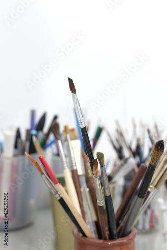 Artist's brushes in a Jar