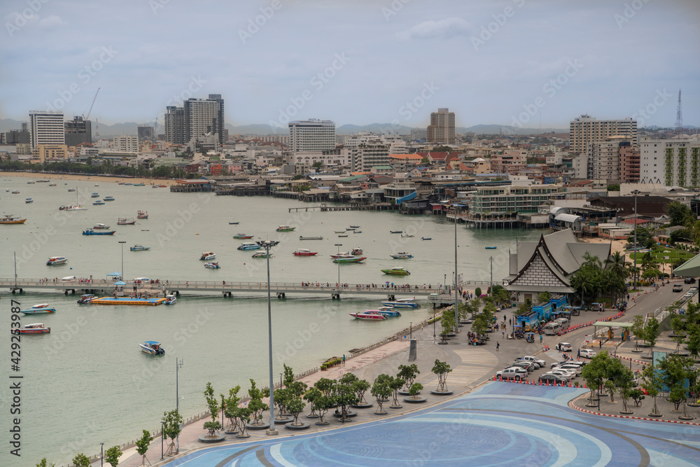 Pattaya, Thailand , September 7, 2019: View of the Gulf of Siam and the city.Tourists walk along the promenade