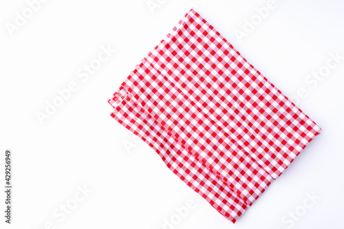 Background red and white fabric checkered tablecloths neatly folded isolated on white background with copy space.