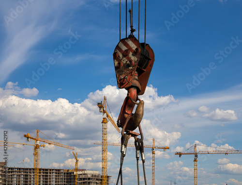 Part of a construction machine (excavator or crane) on the background construction site, industrial image. Moscow, Russia © Владимир Журавлёв