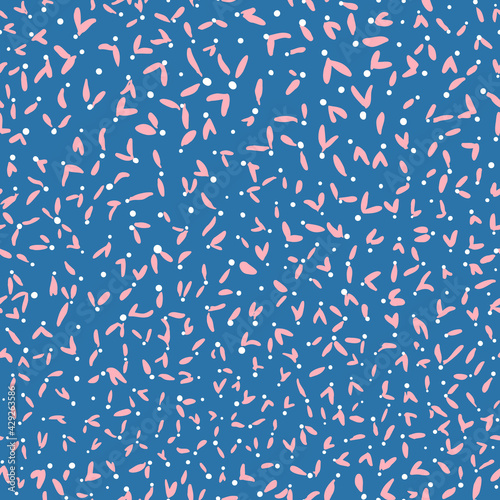 Abstract Ditsy Daisies Seamless Pattern. White dots with pink floral petals vector elements all over print on blue background.