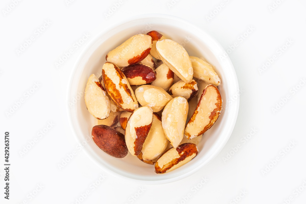 Process of soaking various nuts: Brazilian nut in water to activate. Home Cooking: making plant based organic veggie Milk, lactose free. Process of soaking various nuts: Brazilian nut in water to activate. Home Cooking: making plant based organic veggie Milk, lactose free.
