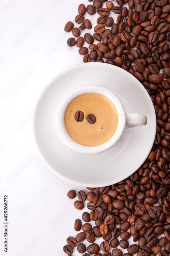 cup of coffee and coffee beans isolated on white background 