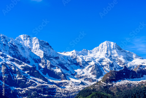 The Swiss Alps at Murren, Switzerland. Jungfrau Region. The valley of Lauterbrunnen from Interlaken. Snow peaks. © karamysh