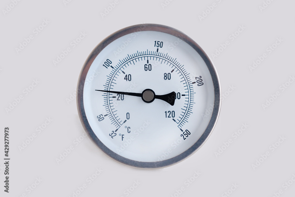 Round thermometer, 25 degrees Celsius and 65 degrees Fahrenheit. cool metal air temperature Round thermometer, 25 degrees Celsius and 65 degrees Fahrenheit. cool metal air temperature