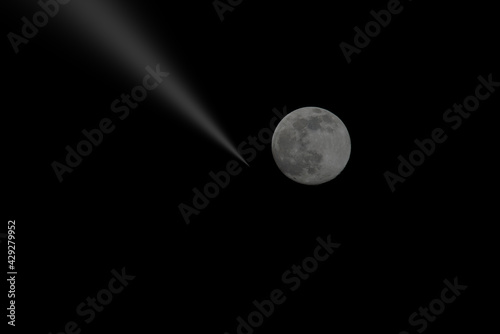 fullmoon in front of a black background