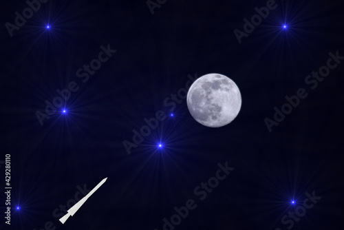 fullmoon in front of a star backround