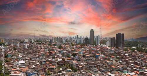 Favela and buildings urban social contrast photo