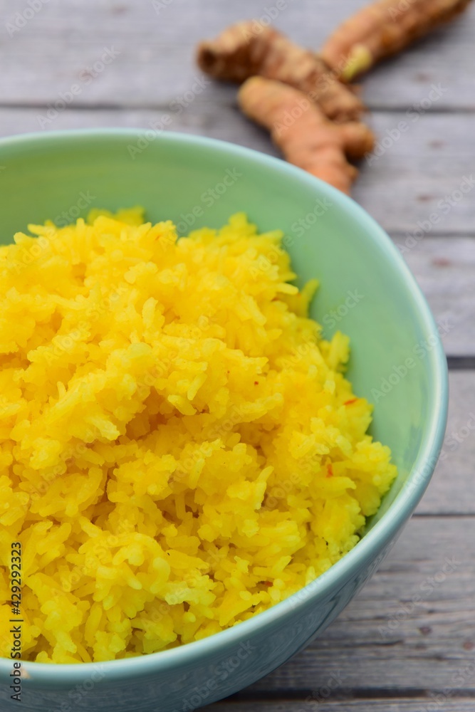 Nasi Kuning or Turmeric rice. Indonesian food Nasi Kuning or Turmeric rice. Indonesian food