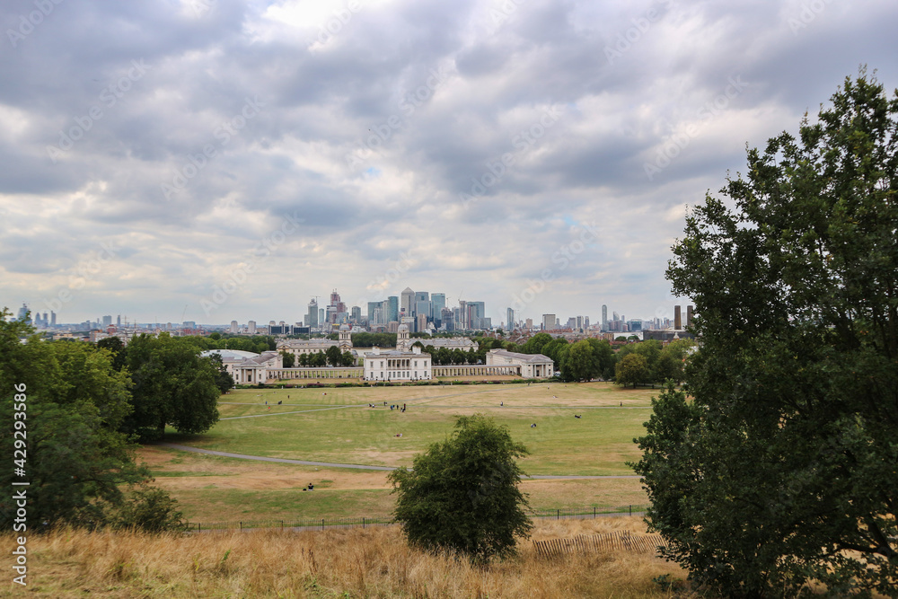 London city panorama with high rises in the distance, and Naval University in the first plan photographed from Greenwich