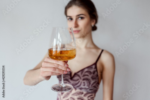 woman enjoying glass of white wine