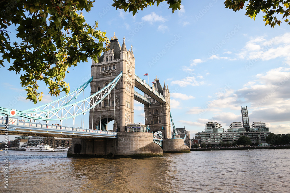 One of the most popular London city architectural attractions, the Tower Bridge crossing Thames river