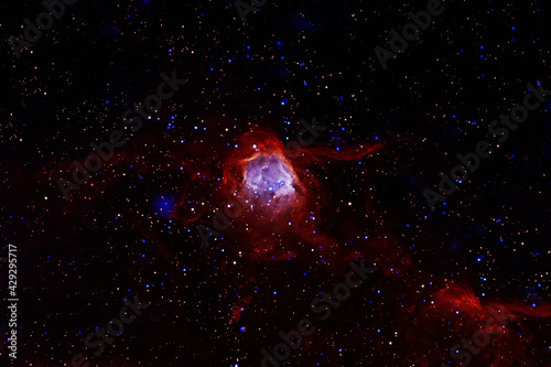 Galaxy in red colors. Elements of this image were furnished by NASA.