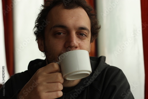 Young man having a coffee 