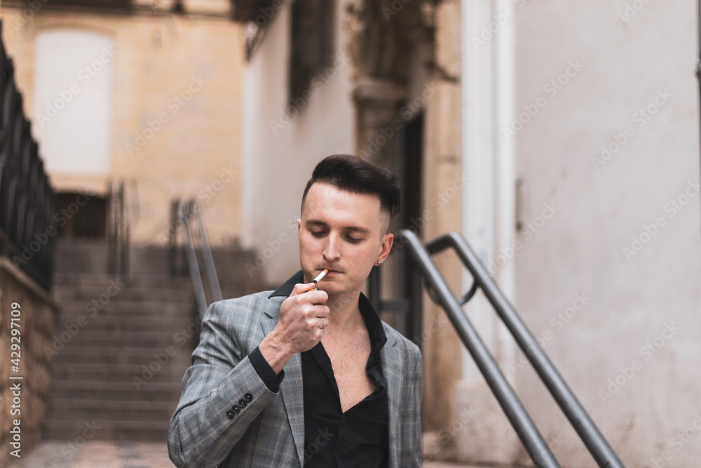 Fototapeta premium young businessman doing everyday things on the street