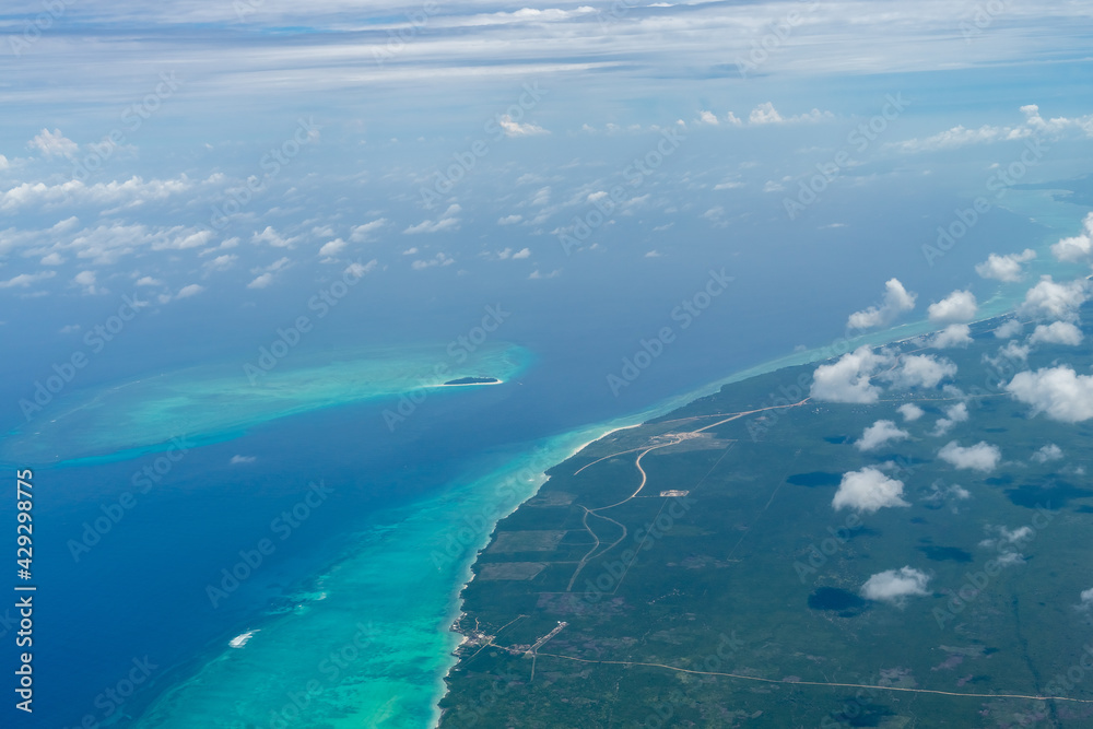 Aerial view on Zanzibar. Zanzibar is a tanzanian island in the indian ocean, blue ocean sea background