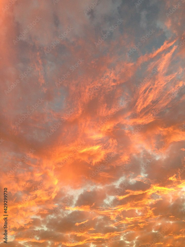 Fiery sunset with orange clouds