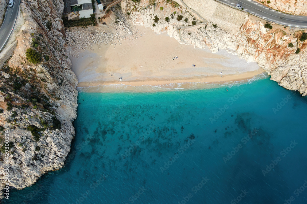 Beach summer holiday on Kaputas beach in resort Turkey on Mediterranean sea. Aerial view of sandy beach