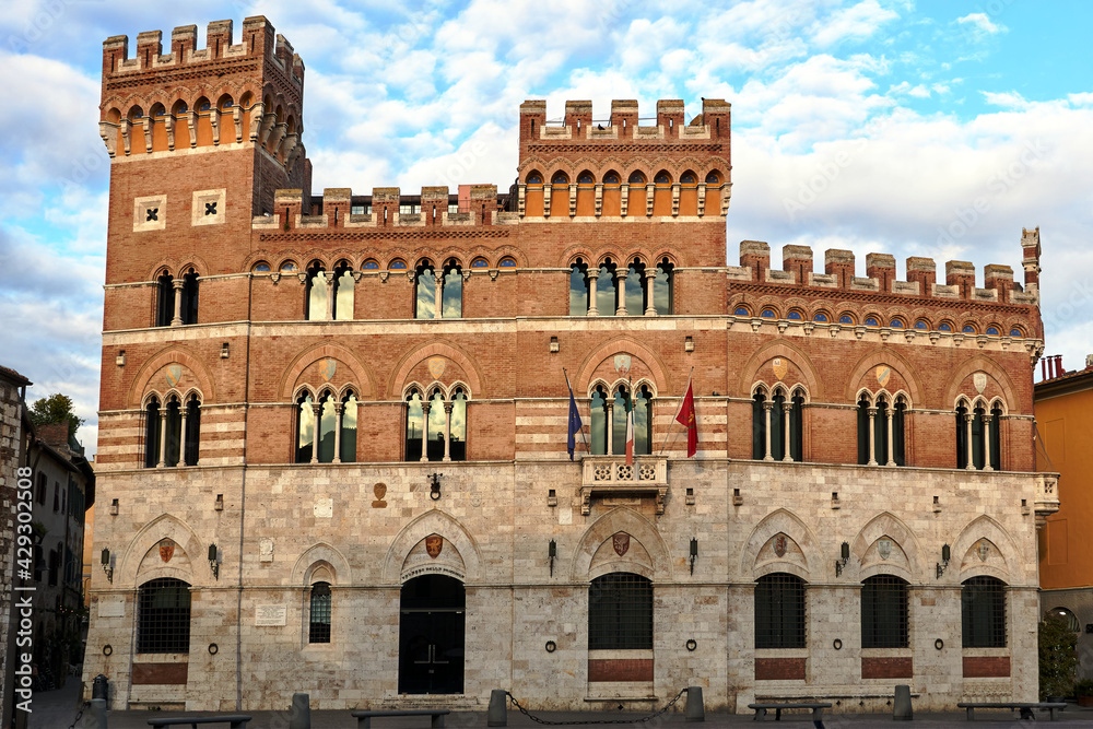 Towers of a renaissance brick castle in the city of Grosseto
