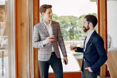 Two businessmen working at the office photo