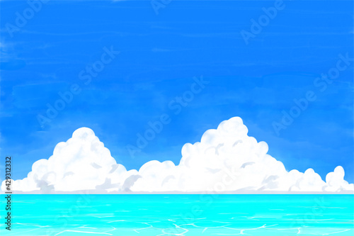 夏の青空と入道雲、エメラルドグリーンの海