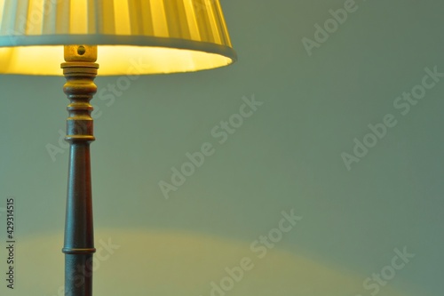 dim lighting room of the mahogany antique lamp.This expensive furniture is made in England. blurred background soft focus image.
