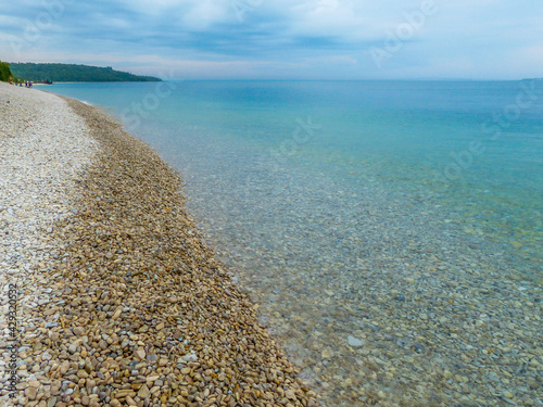 summer sunrise on the Mackinac island beach - Michigan