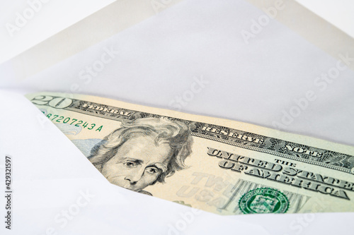 Картината върху платно US dollars inside an envelope, a concept of money remittance