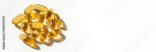 Oil filled capsules on the white background