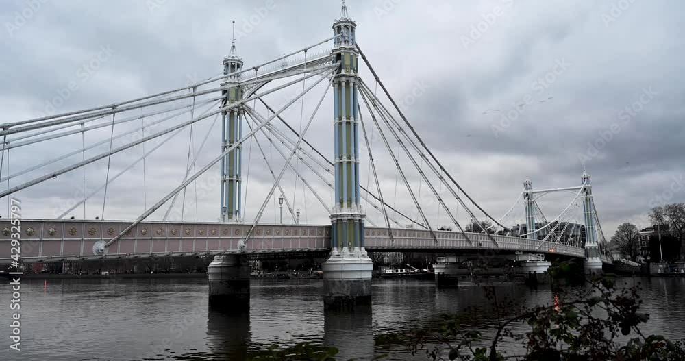 A time-lapse of Albert Bridge from Battersea Park in the evening A time-lapse of Albert Bridge from Battersea Park in the evening