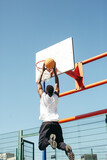  Basketball player in action and dunking