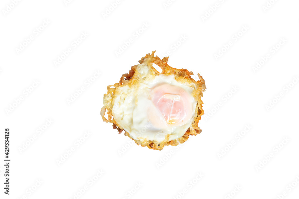 Fried egg crispy edges isolated on white background with clipping path. Fried egg crispy edges isolated on white background with clipping path.