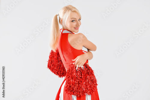 Beautiful cheerleader on li...