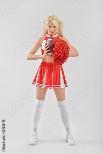 Beautiful cheerleader with ...