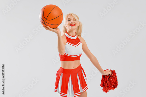 Beautiful cheerleader with ...
