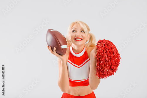 Beautiful cheerleader with ...