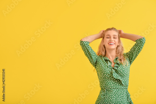 Fashionable young woman on ...