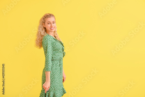 Fashionable young woman on ...