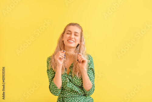 Fashionable young woman on ...
