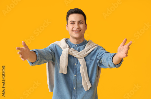 Young man opening arms for ...