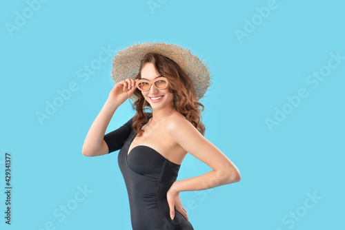 Beautiful young woman in sw...