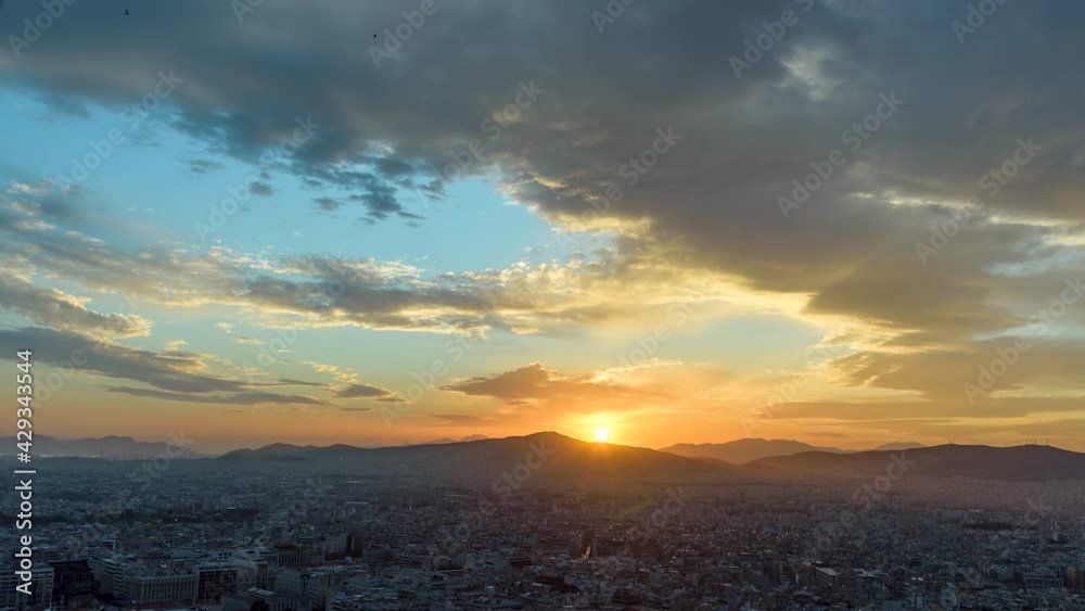 Holy grail timelapse above city of Athens from Lycabettus hill with burning sky Holy grail timelapse above city of Athens from Lycabettus hill with burning sky