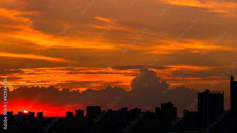 The high angle background of the city view with the secret light of the evening, blurring of night lights, showing the distribution of condominiums, dense homes in the capital community