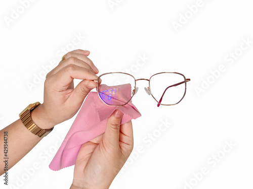 Wiping glasses with disinfectant due to the coronavirus outbreak