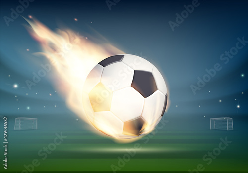 Burning soccer ball flies over the stadium.
